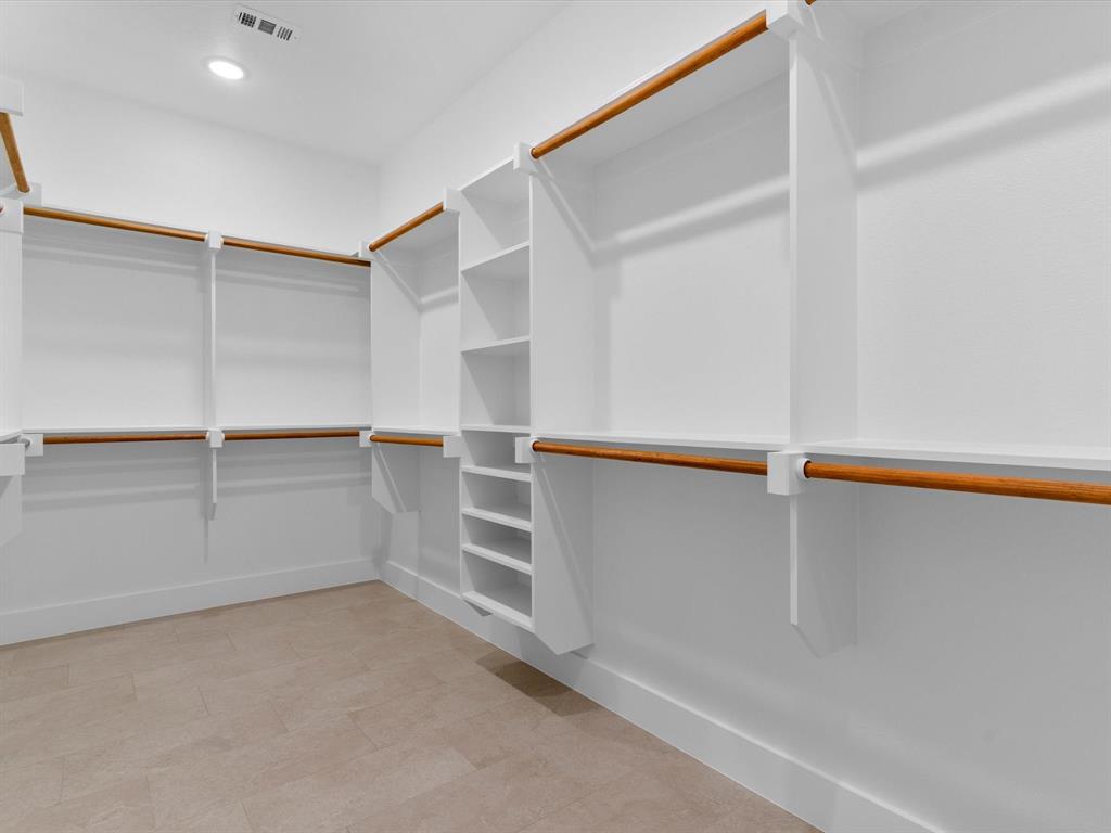 1623 County Road 4764 Boyd, TX 76023 - Photo 16 of 29 a view of an empty walk in closet