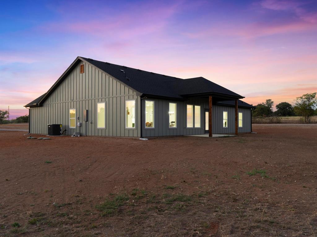 1623 County Road 4764 Boyd, TX 76023 - Photo 26 of 29 a view of a house with a street