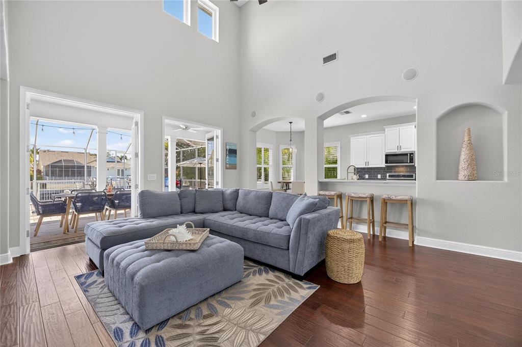 5721 Sea Turtle Place Apollo Beach, FL 33572 - Photo 31 of 80 a living room with furniture and a wooden floor