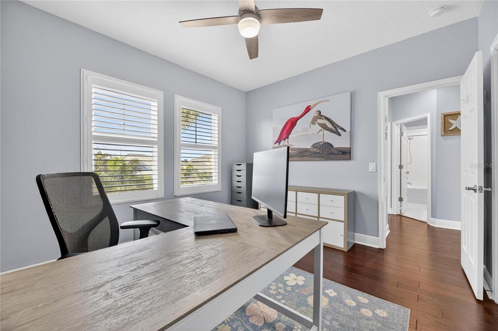 5721 Sea Turtle Place Apollo Beach, FL 33572 - Photo 37 of 80 a living room with furniture and a wooden floor