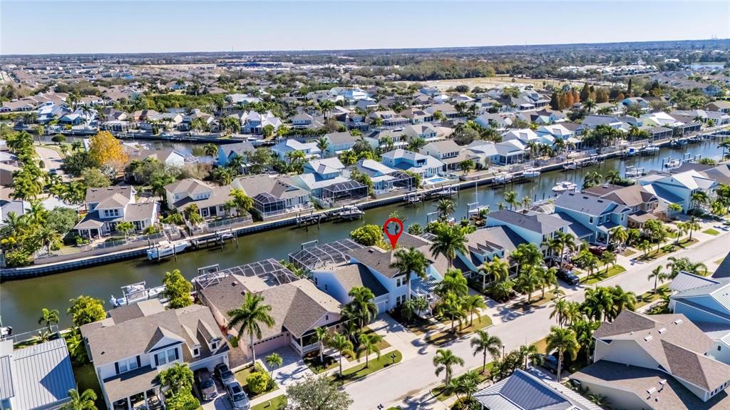 5721 Sea Turtle Place Apollo Beach, FL 33572 - Photo 66 of 80 an aerial view of a city with a lake view