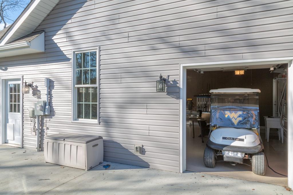3003 Seminole Loop Crossville, TN 38572 - Photo 26 of 28 25-Golf Cart Bay in Garage