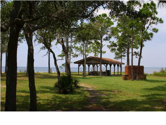 402 Olde Post Road Niceville, FL 32578 - Photo 13 of 13 a view of a big yard with a house
