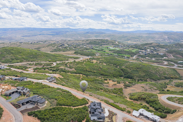 2042 East Wrangler Road, Unit 19 Kamas, UT 84036 - Photo 11 of 14 Bird's eye view of a mountain backdrop
