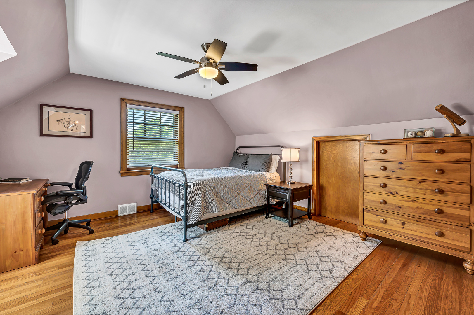 100 South Herbert Road Riverside, IL 60546 - Photo 24 of 30 a bedroom with a bed and a chandelier