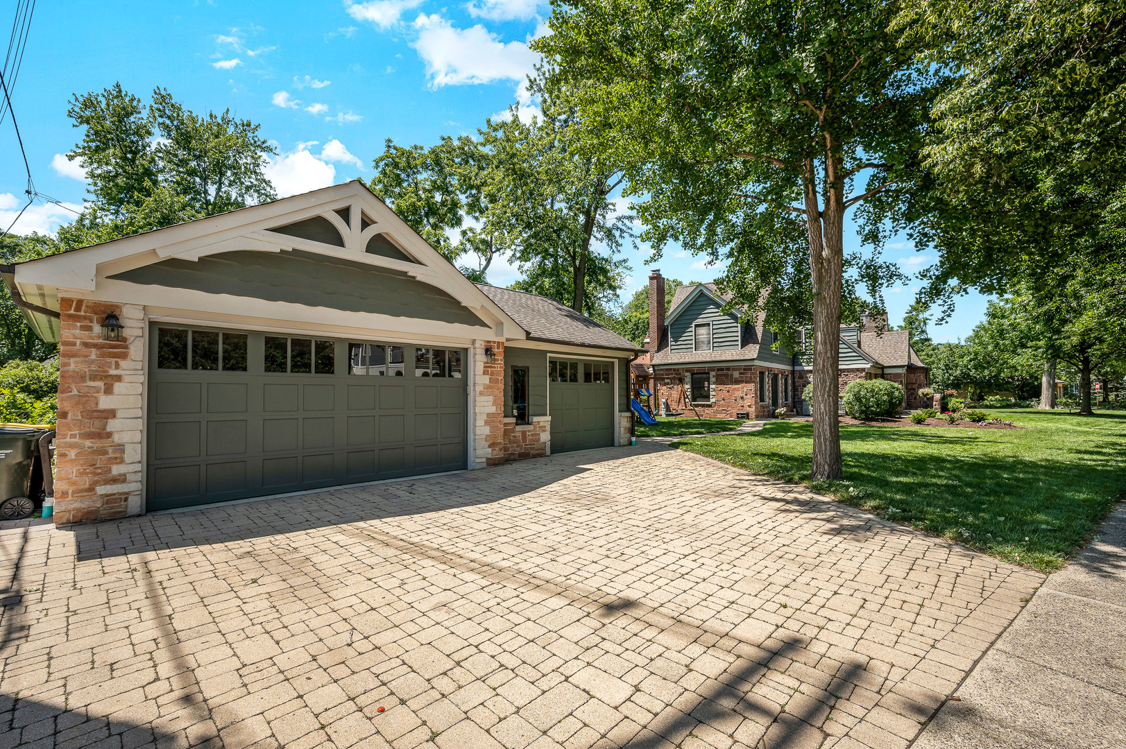 100 South Herbert Road Riverside, IL 60546 - Photo 30 of 30 a front view of a house with a garden