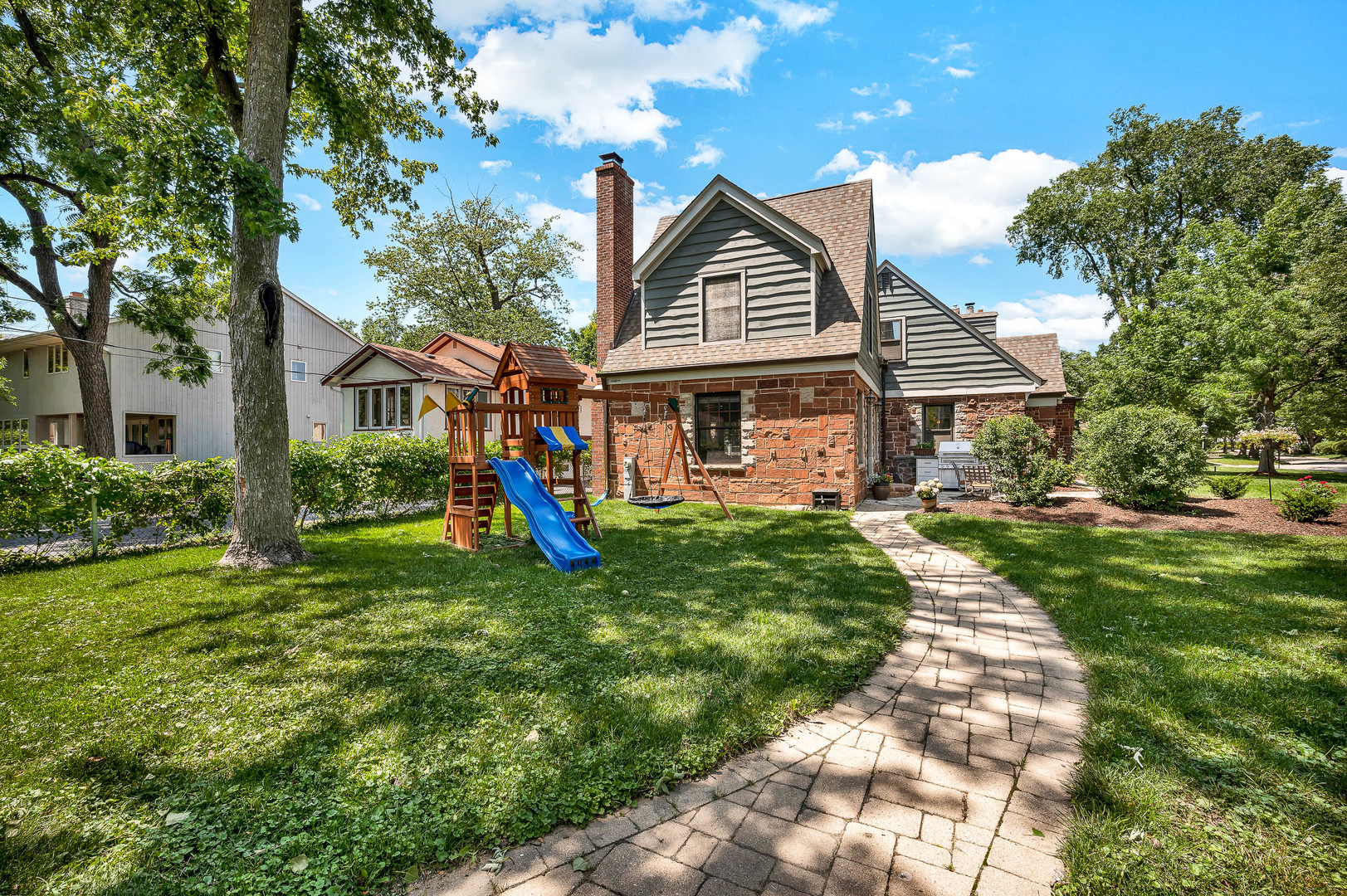 100 South Herbert Road Riverside, IL 60546 - Photo 4 of 30 a view of a house with a yard