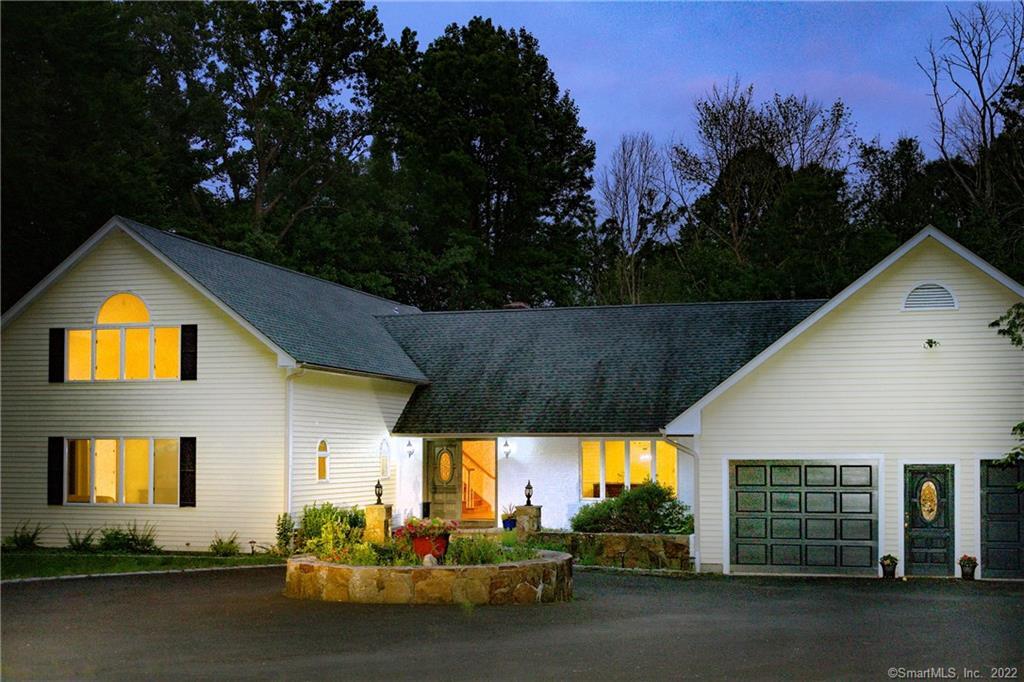 45 Wyldewood Road Easton, CT 06612 - Photo 1 of 1 a view of a house with a street