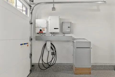 a view of a storage & utility room with washer and dryer