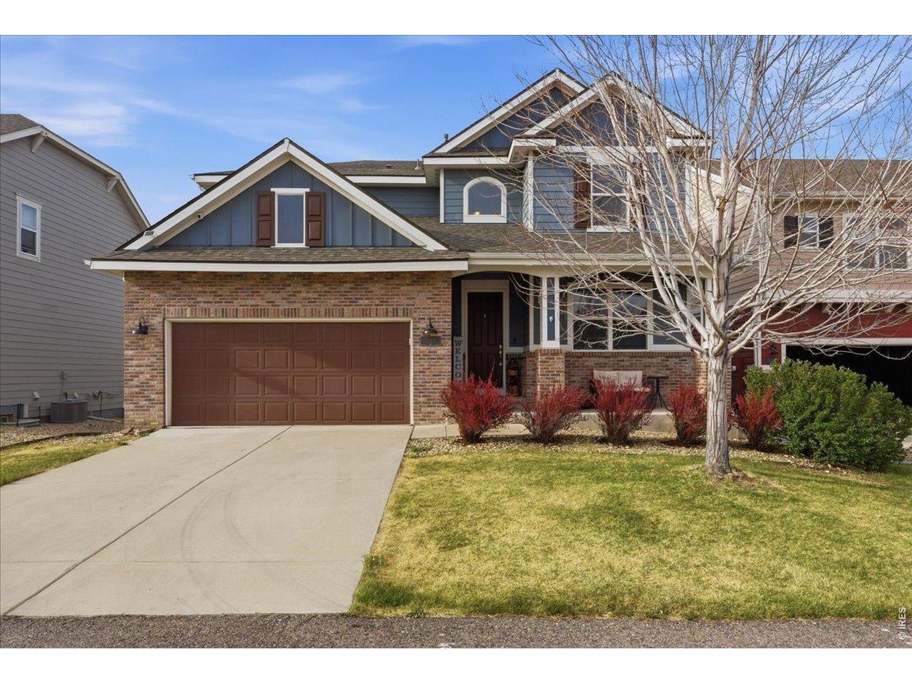 1148 Wagon Bend Road Berthoud, CO 80513 - Photo 4 of 50 a front view of a house with a yard