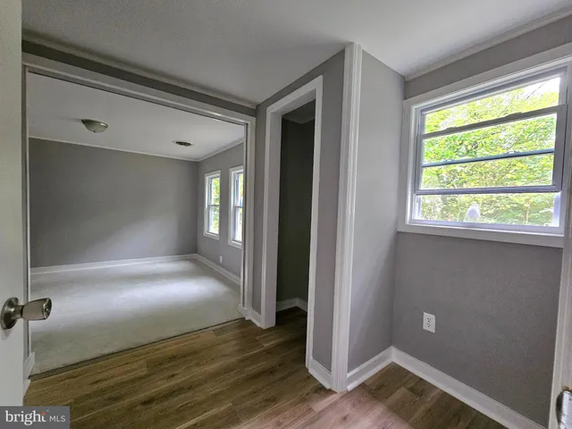 an empty room with windows