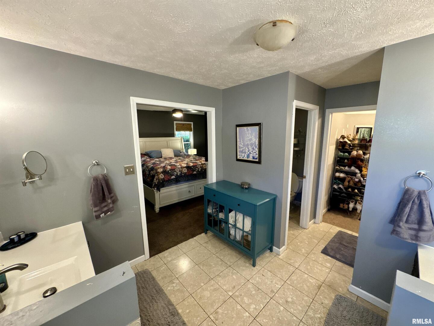 1801 Colonial Drive Marion, IL 62959 - Photo 23 of 45 a bedroom with furniture and a window