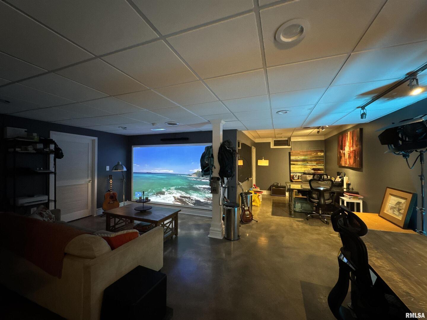 1801 Colonial Drive Marion, IL 62959 - Photo 27 of 45 a living room with furniture and a flat screen tv