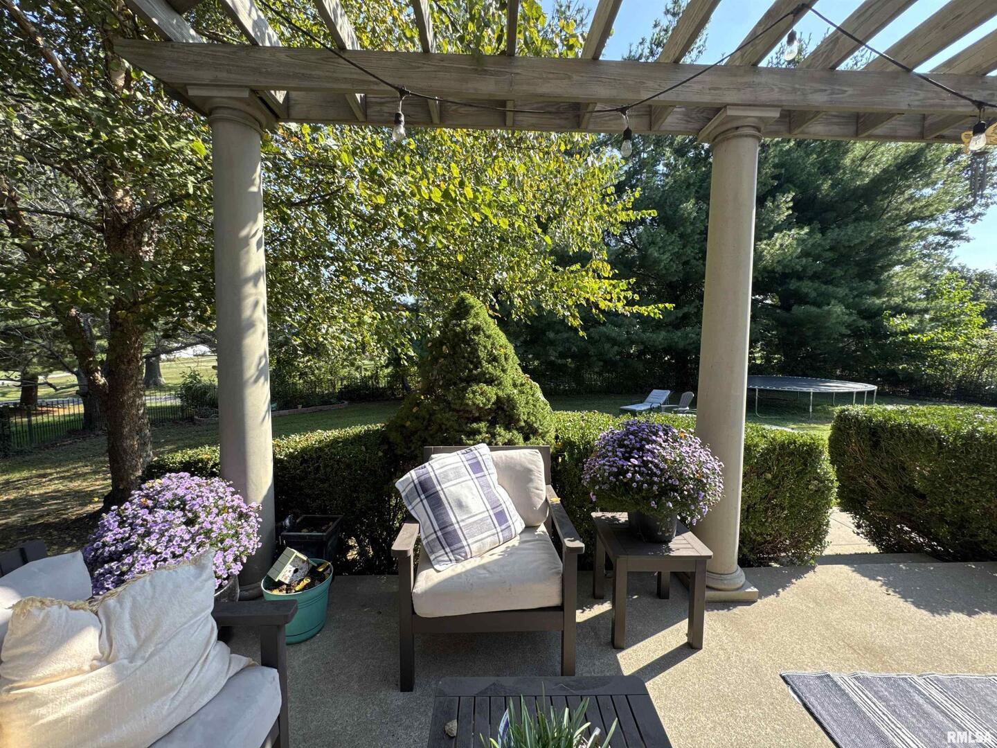 1801 Colonial Drive Marion, IL 62959 - Photo 35 of 45 a view of a patio with couple of chairs and a fire pit