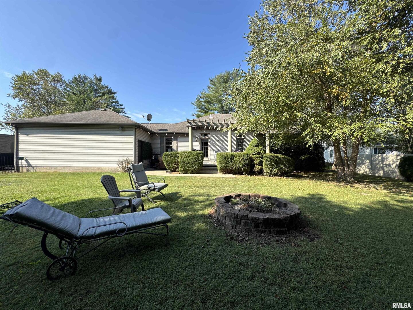 1801 Colonial Drive Marion, IL 62959 - Photo 38 of 45 a view of a house with backyard sitting area and garden