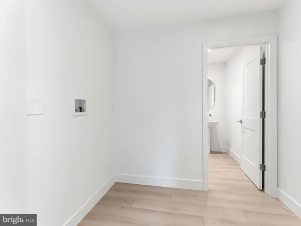 a bathroom with a toilet sink and shower