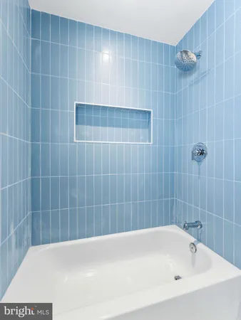 a view of an empty room with stairs and ventilation