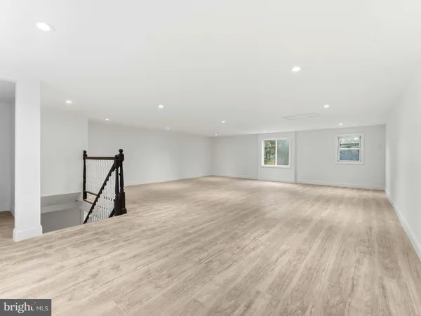 an aerial view of a house with yard swimming pool and outdoor seating