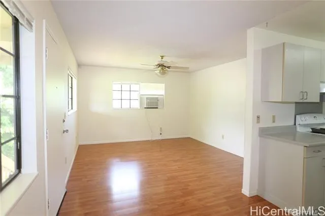 a view of a kitchen with a sink and dishwasher