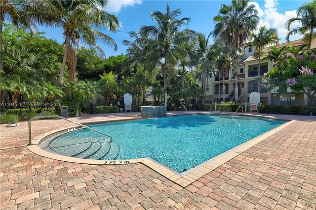 a view of a yard with a patio