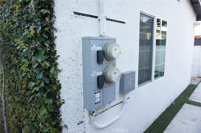 a sign that is on a brick wall