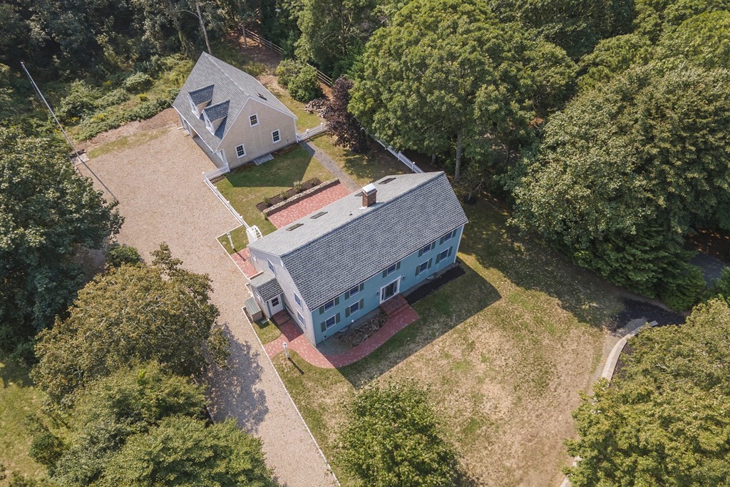 93 Beach Road Orleans, MA 02653 - Photo 2 of 28 a view of a house with a yard
