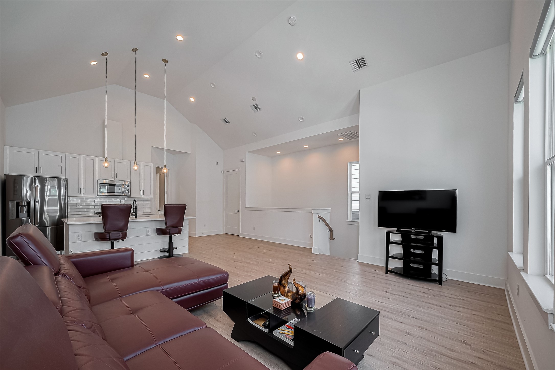 2518 Terry Street Houston, TX 77009 - Photo 4 of 17 Bright open-concept living and kitchen area with soaring ceilings, recessed lighting, and modern designer finishes throughout.