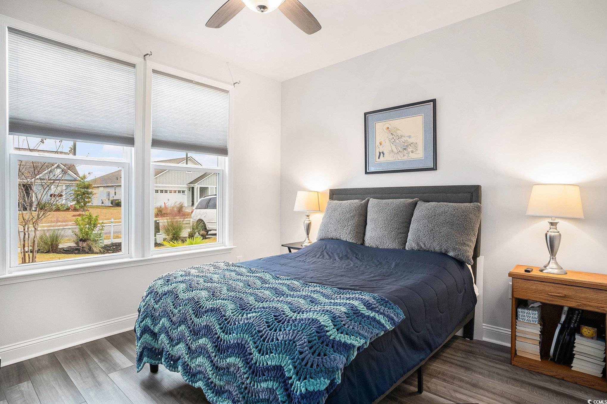 1609 Littleleaf Loop North Myrtle Beach, SC 29582 - Photo 23 of 40 Bedroom with wood finished floors and a ceiling fan