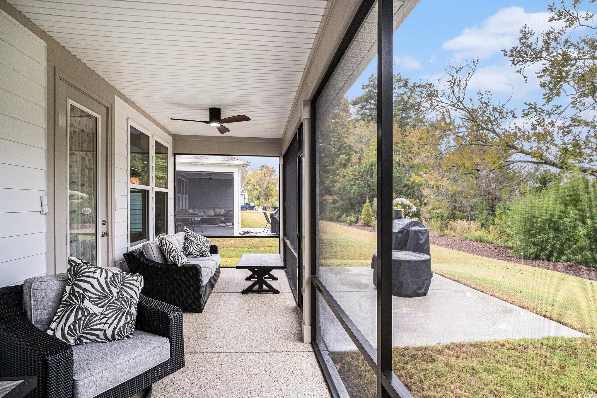 1609 Littleleaf Loop North Myrtle Beach, SC 29582 - Photo 29 of 40 Sunroom / solarium featuring a ceiling fan