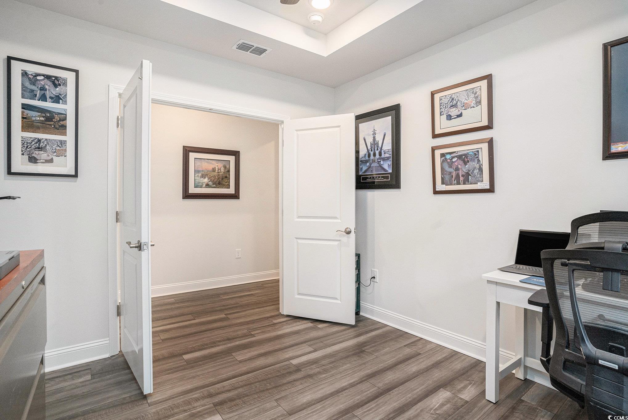 1609 Littleleaf Loop North Myrtle Beach, SC 29582 - Photo 4 of 40 Home office featuring dark wood-style floors and baseboards