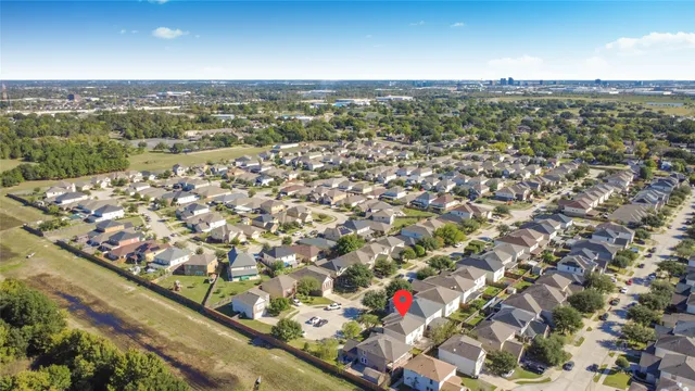 an aerial view of beach and city