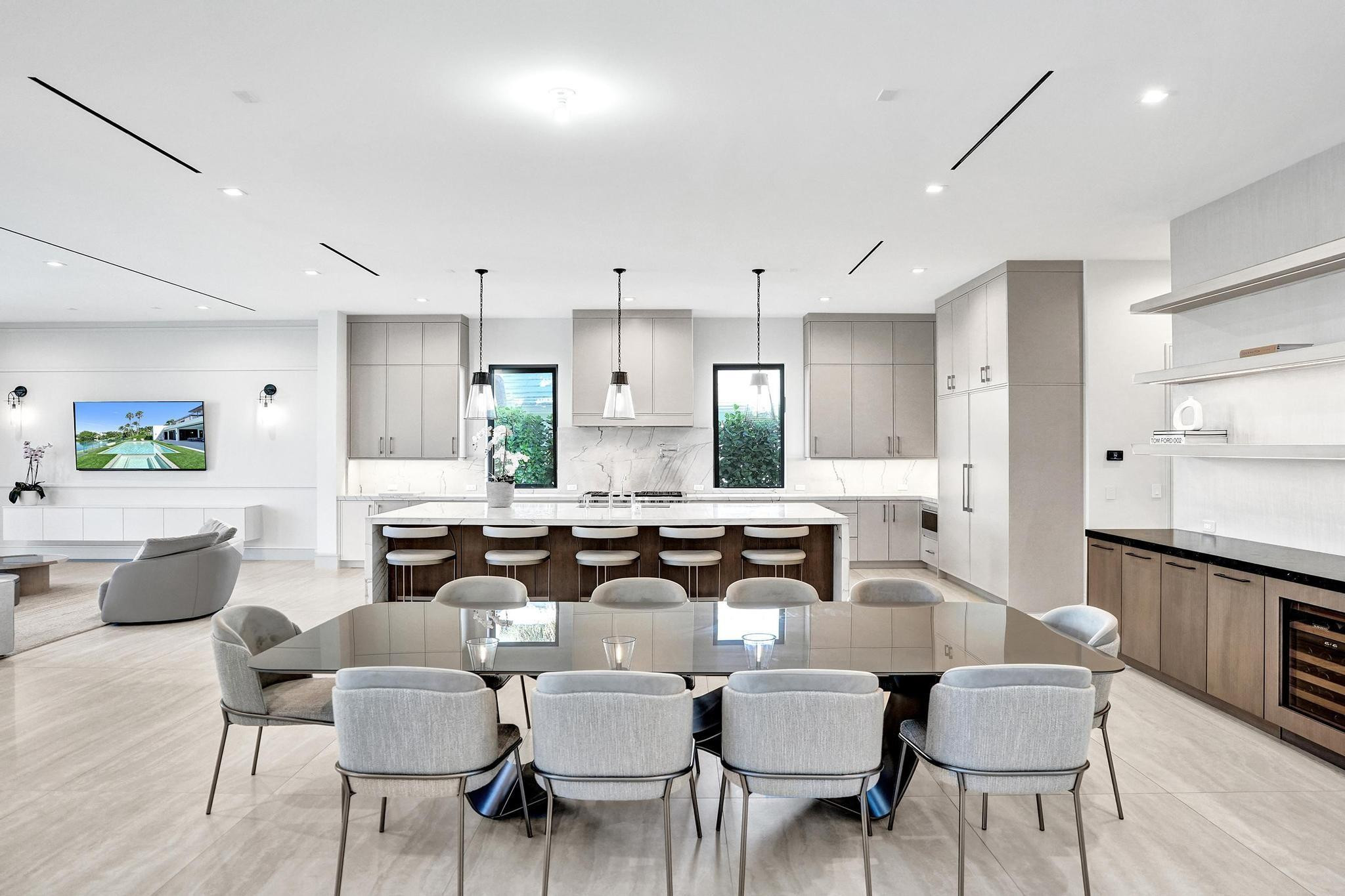 7 Seneca Road Sea Ranch Lakes, FL 33308 - Photo 12 of 65 a view of a dining room with furniture and wooden floor