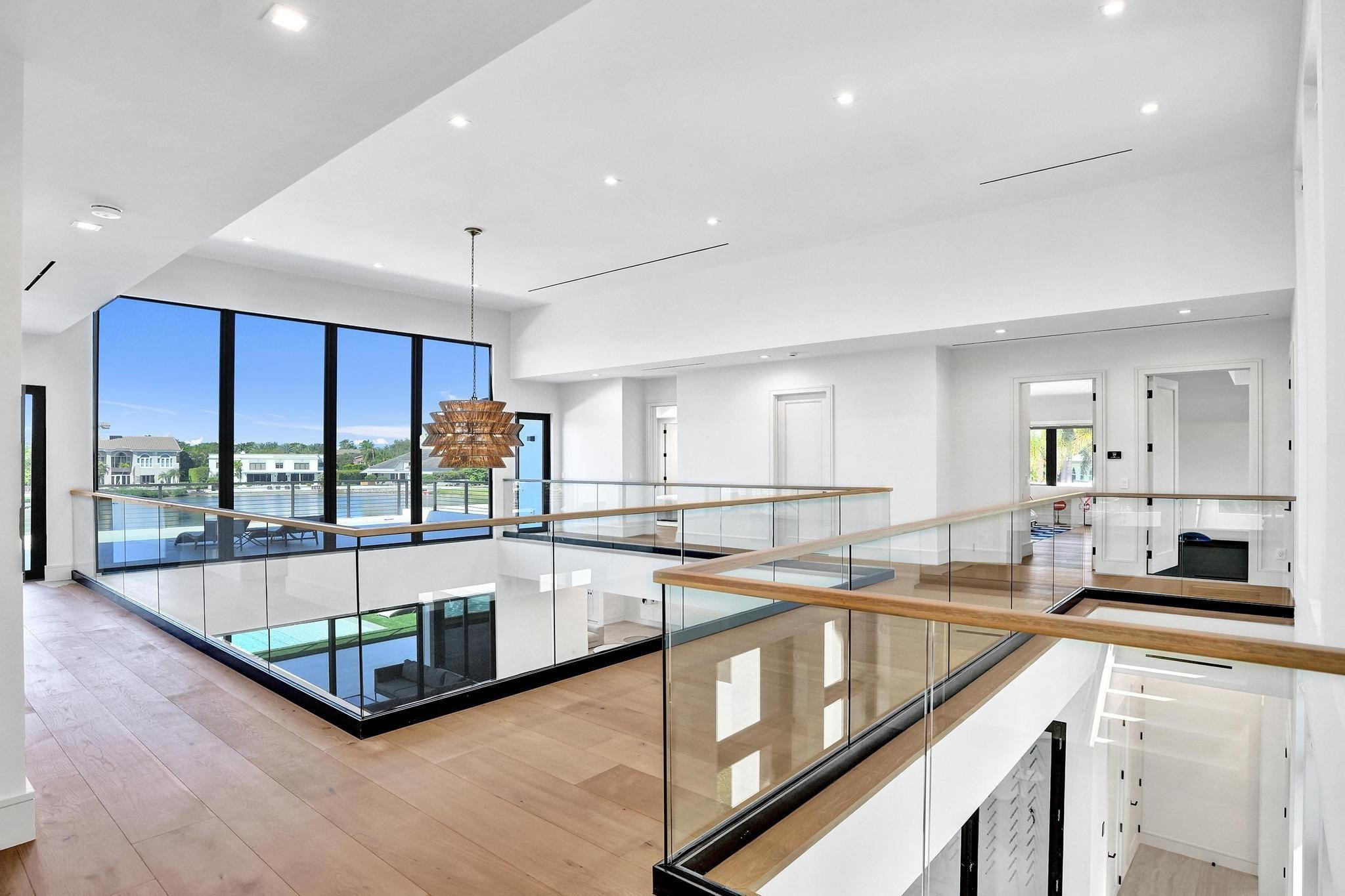 7 Seneca Road Sea Ranch Lakes, FL 33308 - Photo 35 of 65 a large white kitchen with a large window