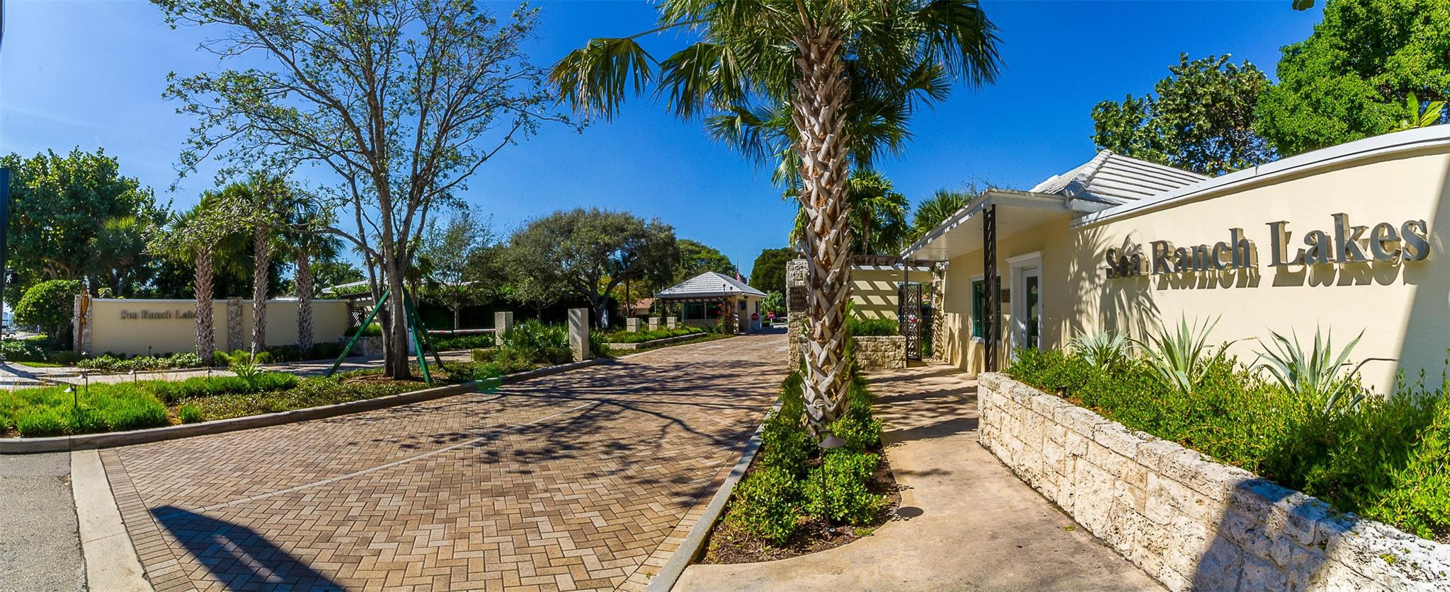 7 Seneca Road Sea Ranch Lakes, FL 33308 - Photo 51 of 65 a view of a pathway with a yard