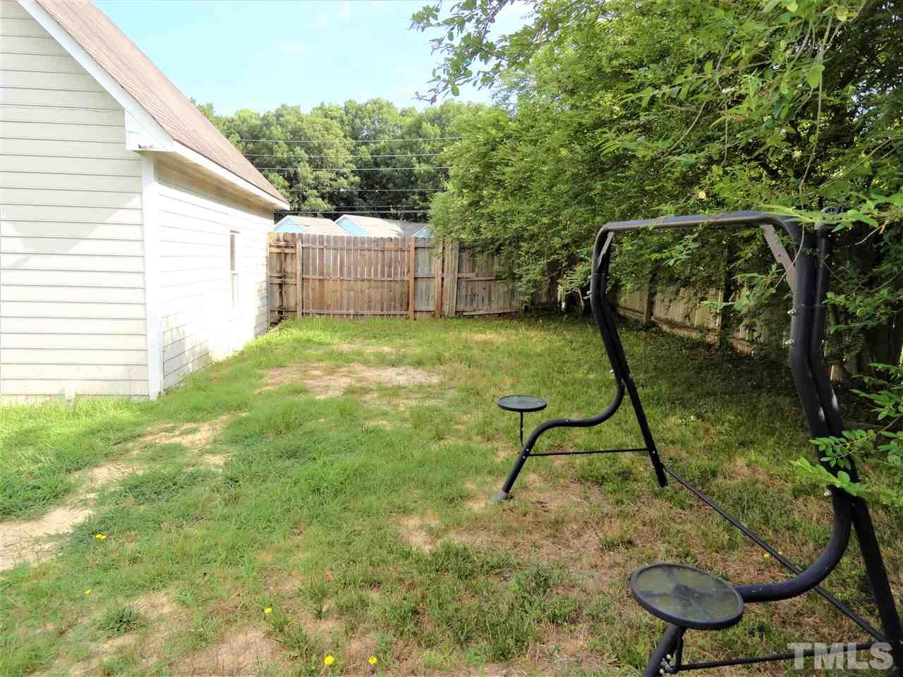 3632 Singleleaf Lane Raleigh, NC 27616 - Photo 22 of 23 a backyard of a house