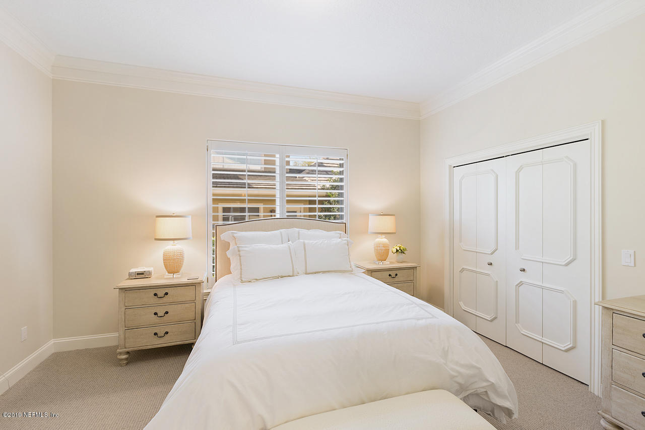 116 Governors Road Ponte Vedra Beach, FL 32082 - Photo 27 of 57 a large white bed in a white room