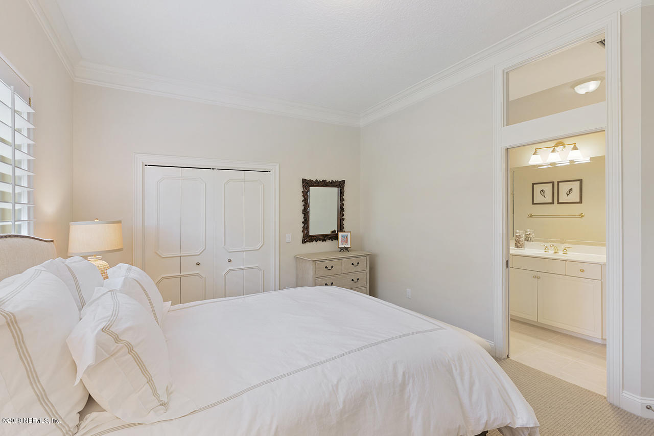 116 Governors Road Ponte Vedra Beach, FL 32082 - Photo 28 of 57 a bedroom with a bed and a tv