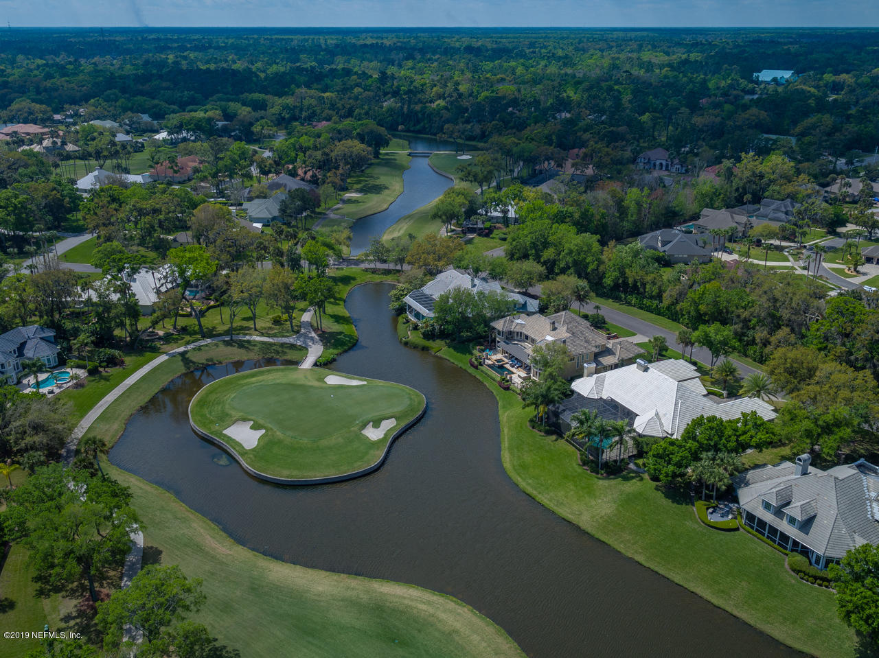 116 Governors Road Ponte Vedra Beach, FL 32082 - Photo 41 of 57 an aerial view of a house with a yard and lake view