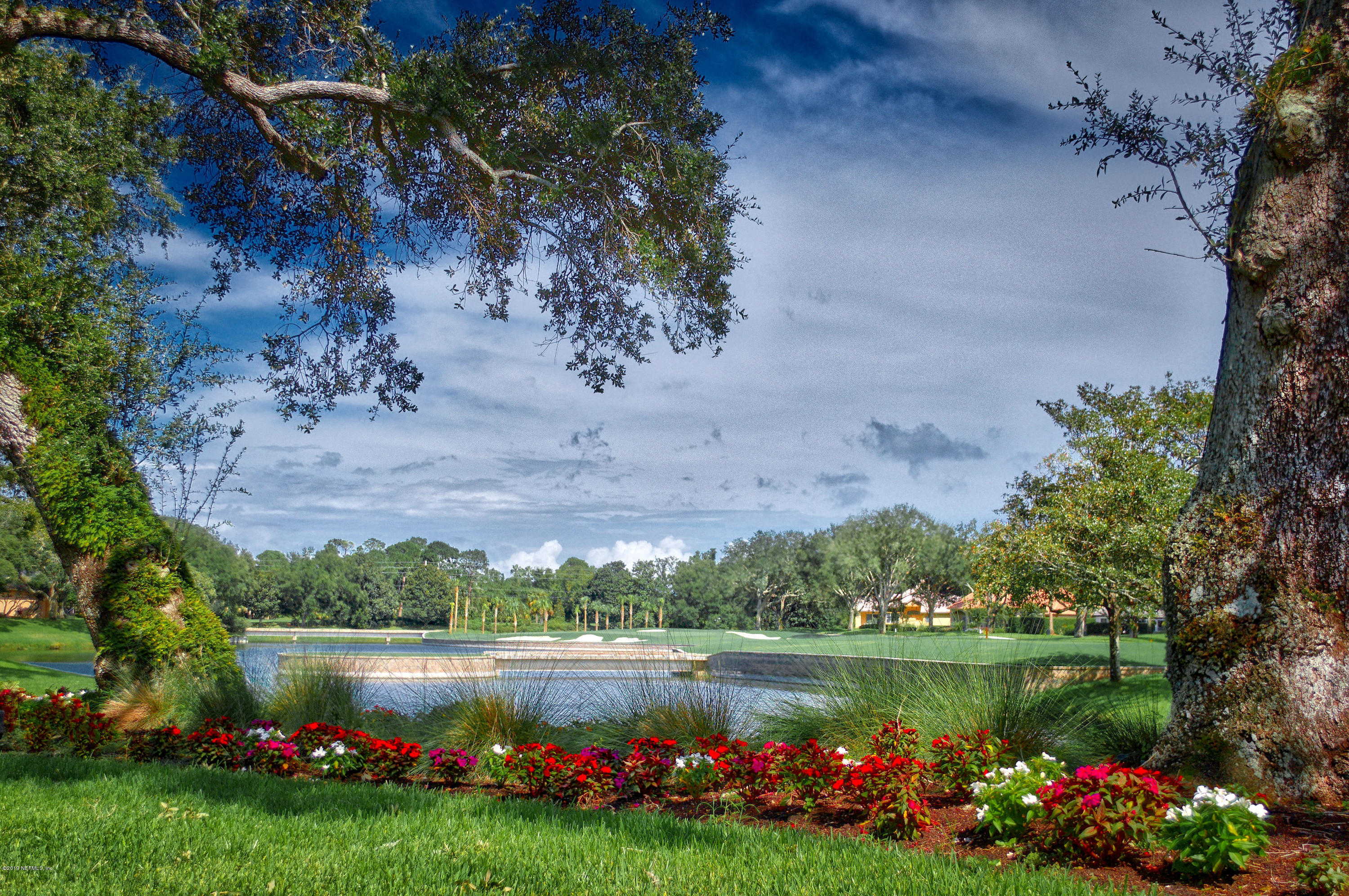 116 Governors Road Ponte Vedra Beach, FL 32082 - Photo 55 of 57 a view of a pond with a garden and a lake view
