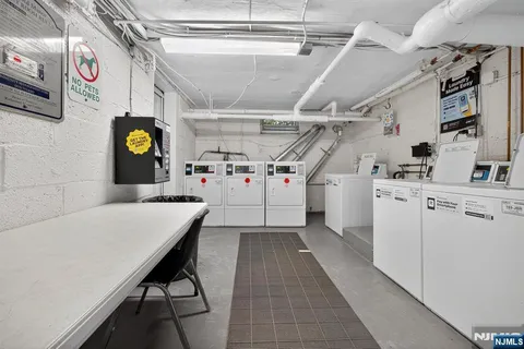 a utility room with cabinets