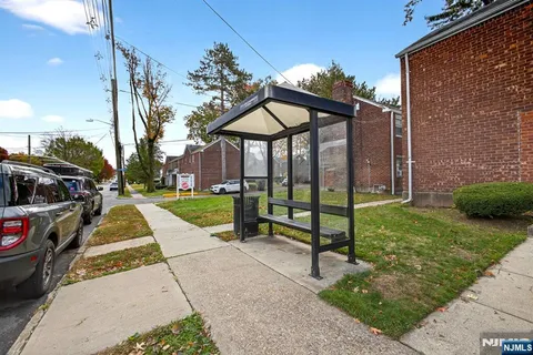 a view of a park with swings and slides