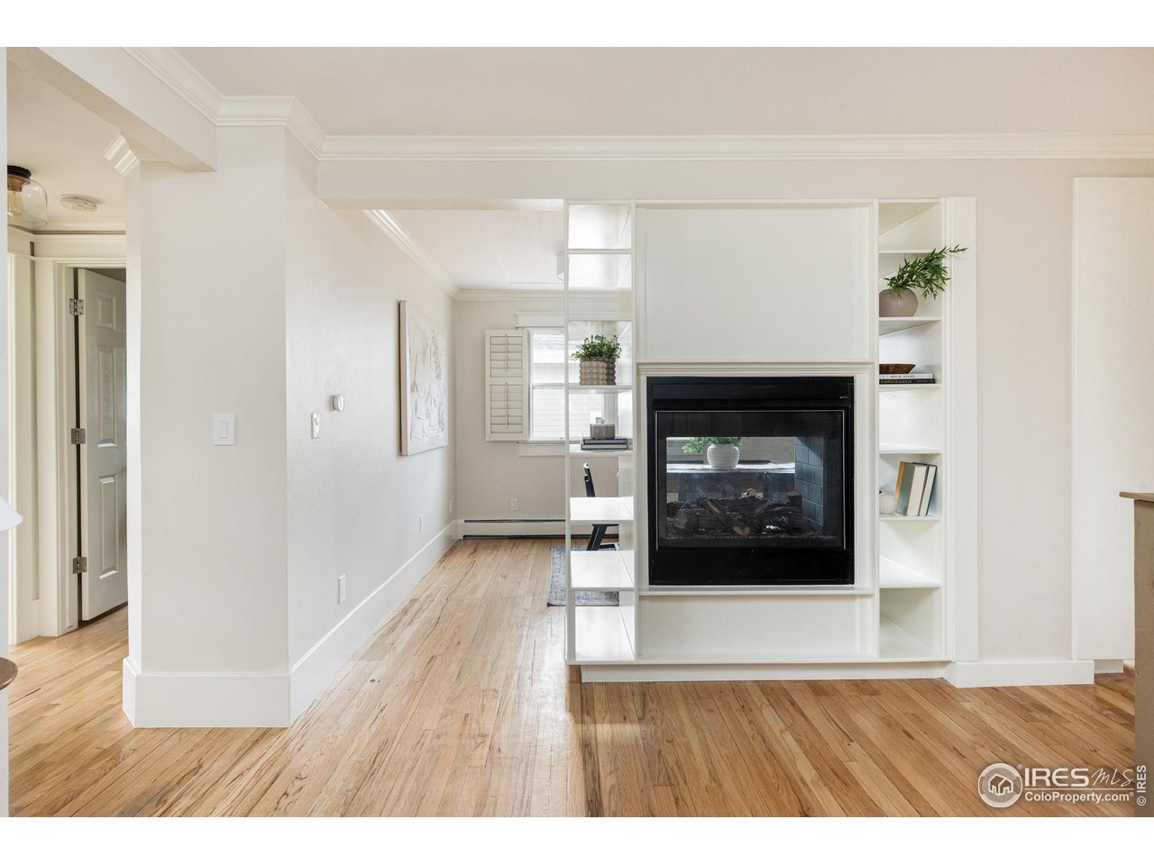 721 Concord Avenue Boulder, CO 80304 - Photo 14 of 40 a view of a livingroom with a fireplace and window