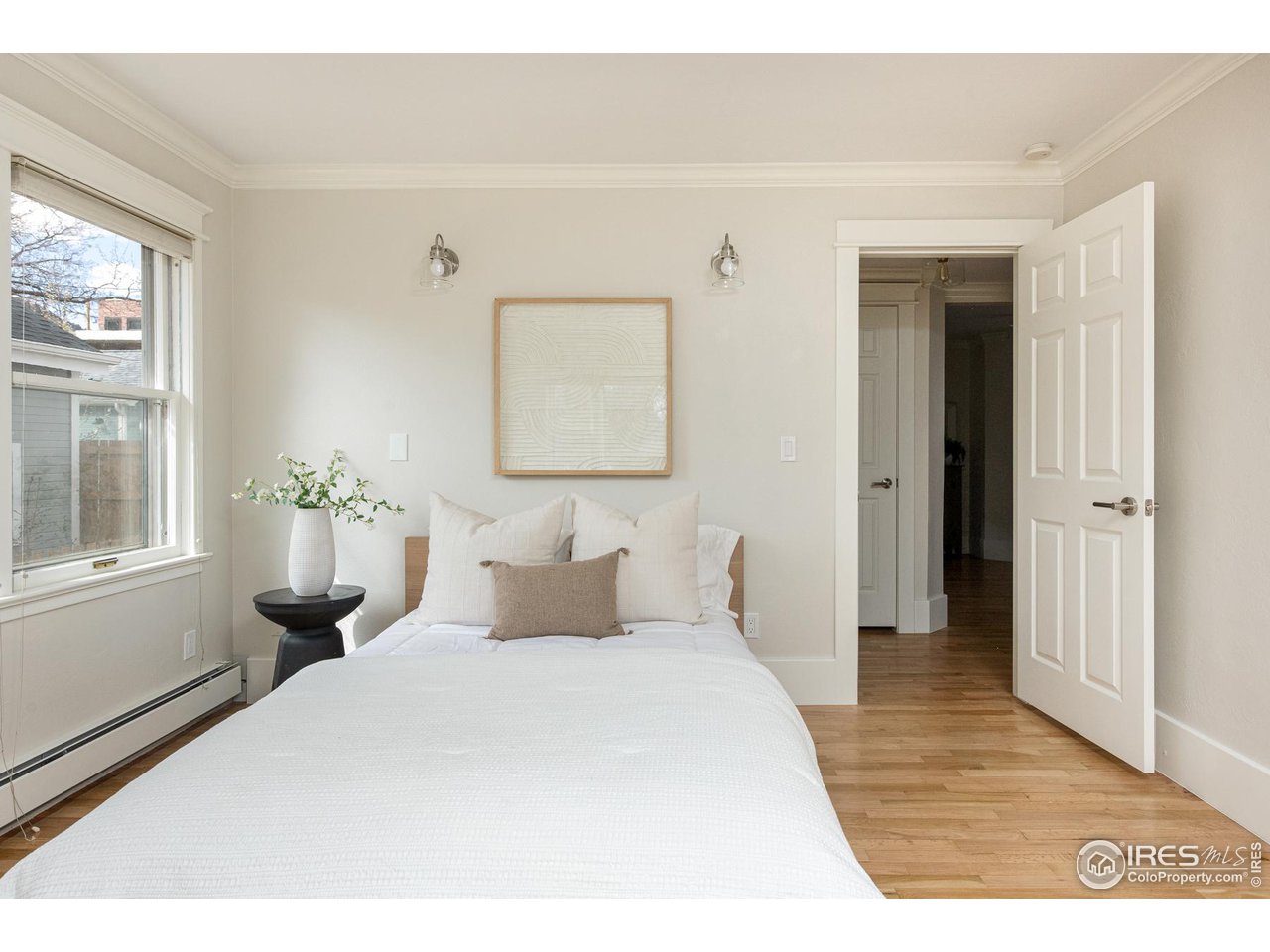 721 Concord Avenue Boulder, CO 80304 - Photo 18 of 40 a bedroom with a bed and a window