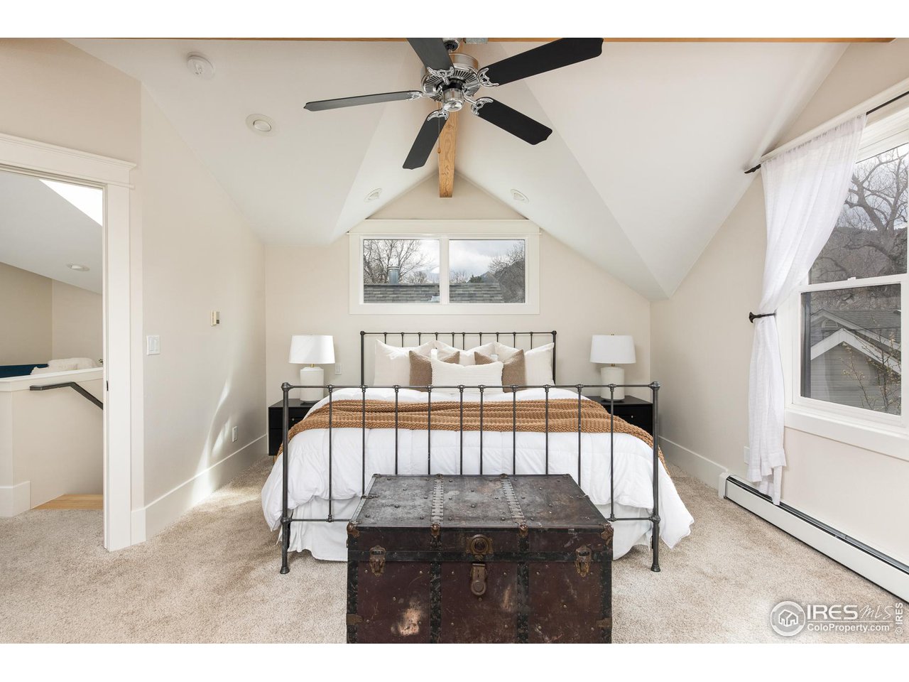 721 Concord Avenue Boulder, CO 80304 - Photo 21 of 40 a bedroom with furniture and a window