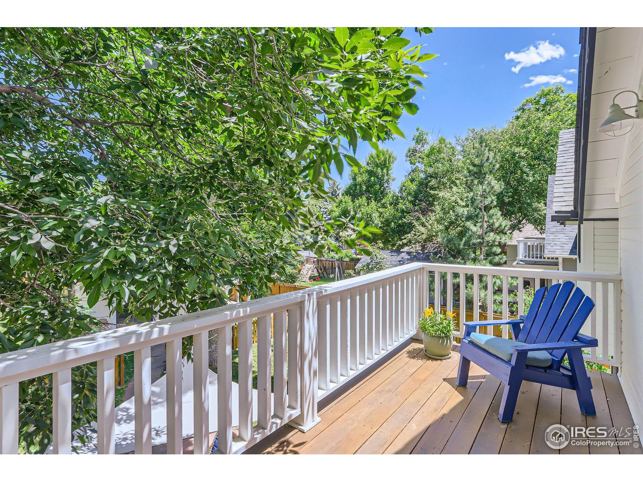 721 Concord Avenue Boulder, CO 80304 - Photo 23 of 40 a view of balcony with wooden floor and outdoor seating