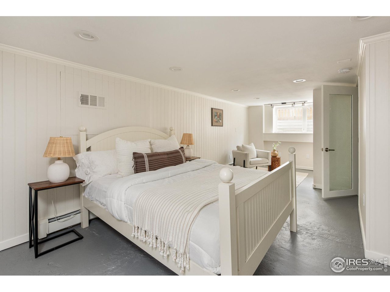 721 Concord Avenue Boulder, CO 80304 - Photo 27 of 40 a bed room with a bed and a night stand