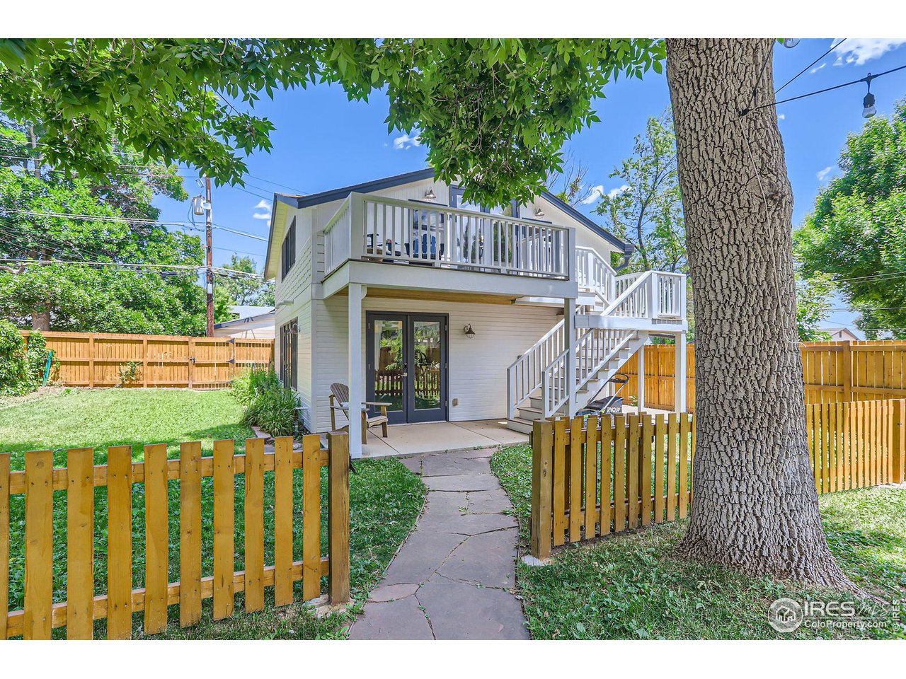 721 Concord Avenue Boulder, CO 80304 - Photo 28 of 40 a view of a house with wooden fence