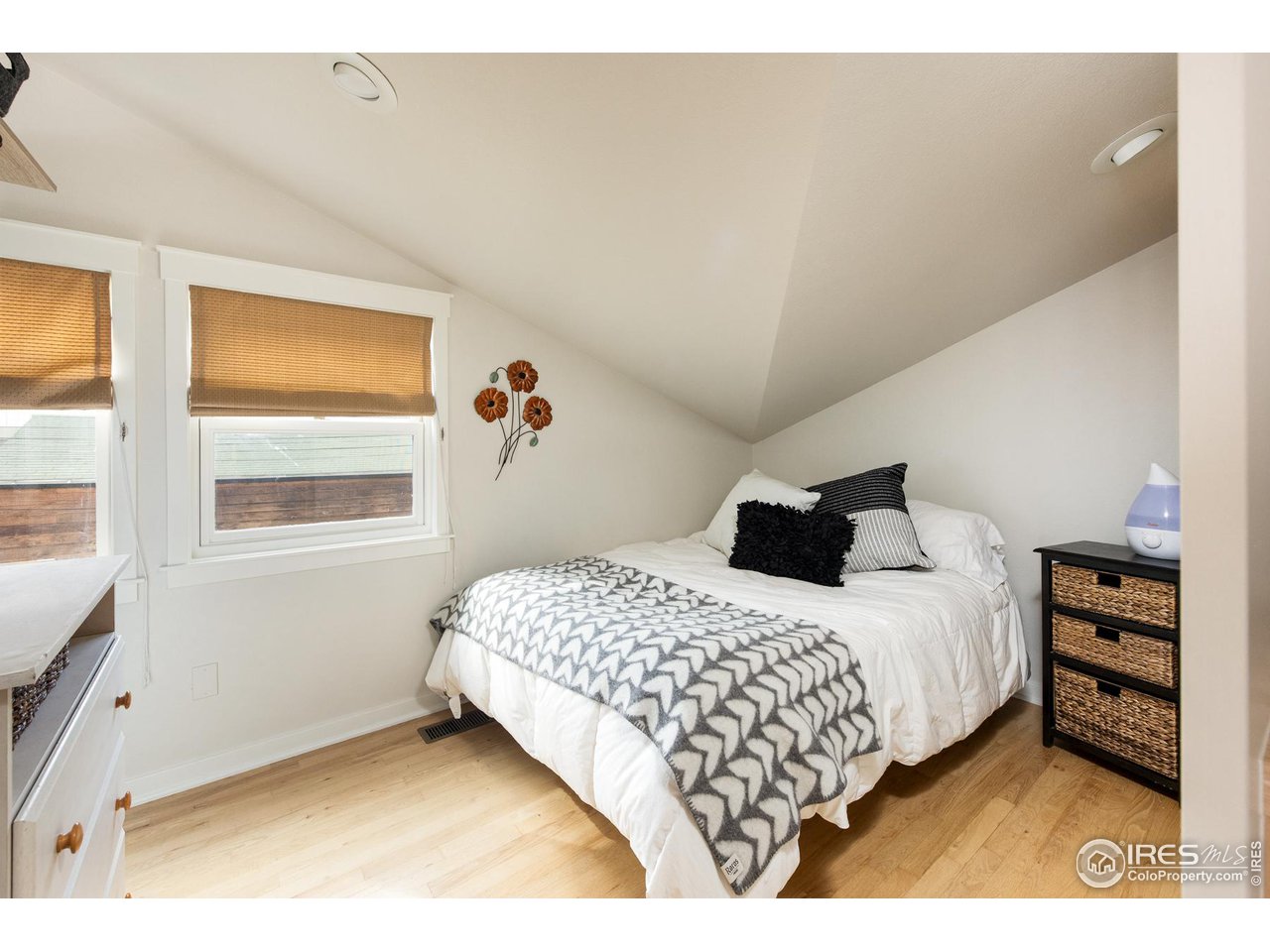 721 Concord Avenue Boulder, CO 80304 - Photo 33 of 40 a bedroom with a bed and a window