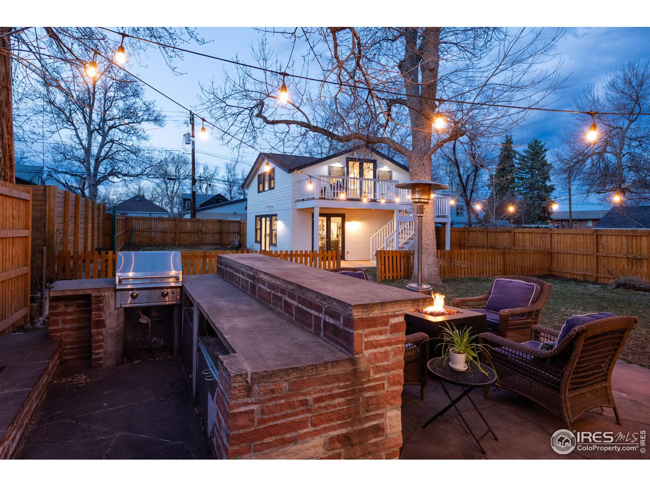 721 Concord Avenue Boulder, CO 80304 - Photo 37 of 40 a backyard of a house with table and chairs