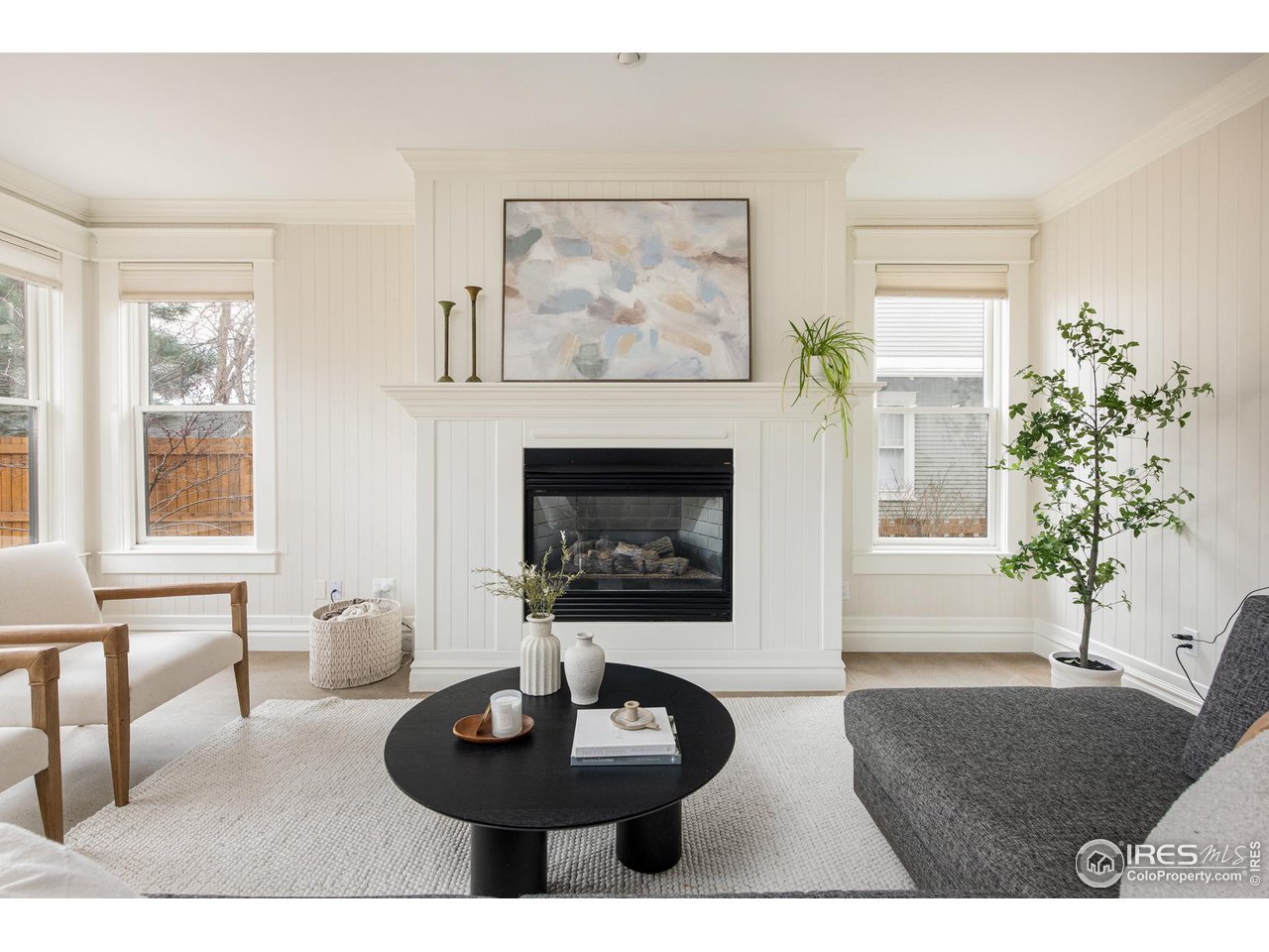 721 Concord Avenue Boulder, CO 80304 - Photo 6 of 40 a living room with furniture and a fireplace